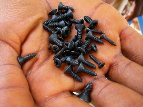 Indelac History of Threaded Screws   A hand full 
